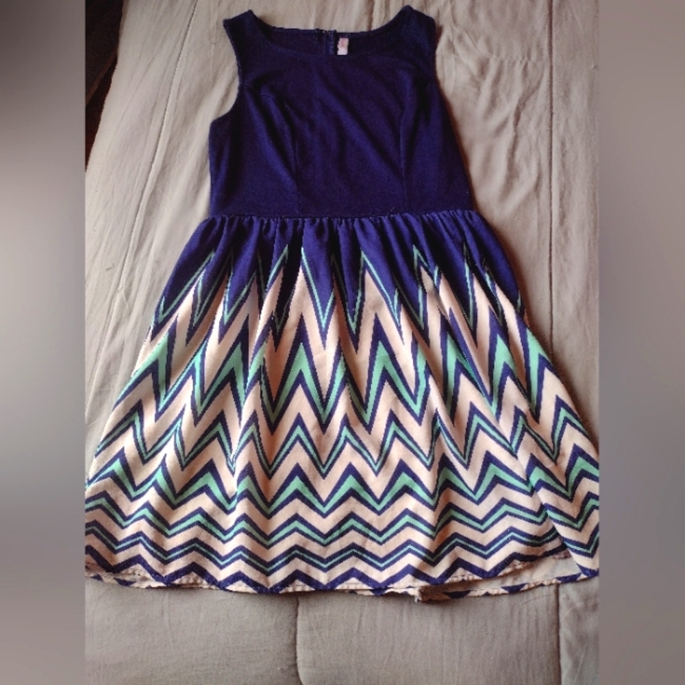 A navy blue, green and white dress.